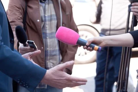 Microphone in focus. press or media interview. Stock Photos