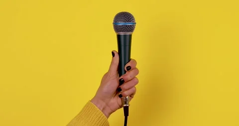 Microphone in Hand Stock Footage 328525488