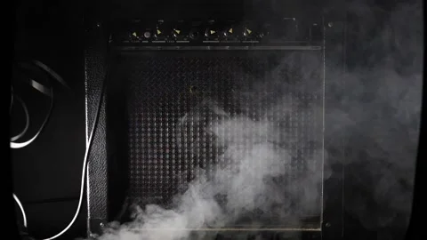 Microphone hitting guitar amplifier and ... | Stock Video | Pond5