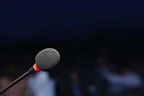 Microphone in a lecture environment with a blurred background Stock Photos