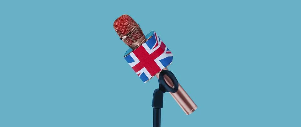 Microphone patterned with the flag of UK, banner Stock Photos