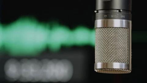Microphone POV while recording podcast, music, interview in studio. Loopable. Stock Footage