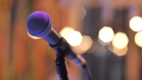 Microphone on the rack behind the lights of light. Stock Footage