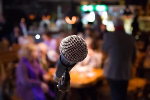 Microphone on rack close-up. Stock Photos