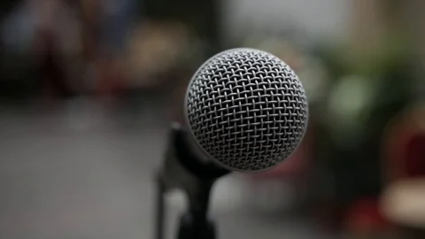 The microphone is shown in close-up. Stock Footage 118019693