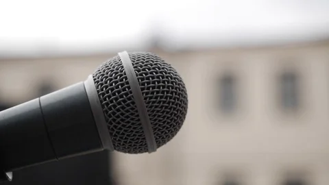 The microphone is shown in close-up. Video stock 118164157