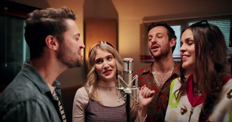 Microphone, singing and group of people in studio for recording music with Stock Footage 332322919