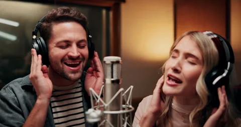 Microphone, singing and musicians in studio with headphones for recording music Stock Footage 332322660