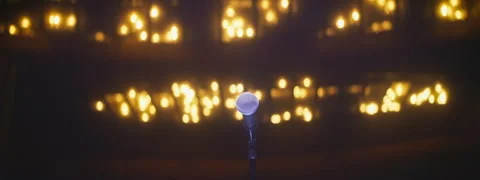 Microphone with smoke on empty stage waiting for performance of artist Stock Footage 252302929