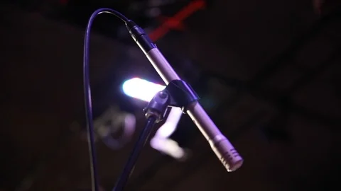 Microphone on stage against a background of auditorium Stock-Footage 102175836