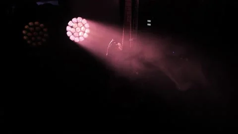 Microphone on stage against background with lighting. Video stock 229556439