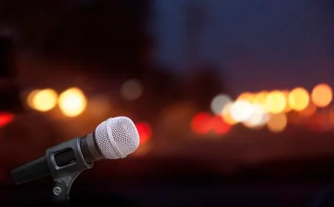 Microphone on stage background Stock Photos