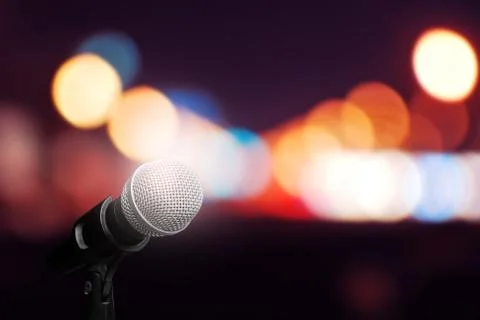 Microphone on stage background Stock Photos