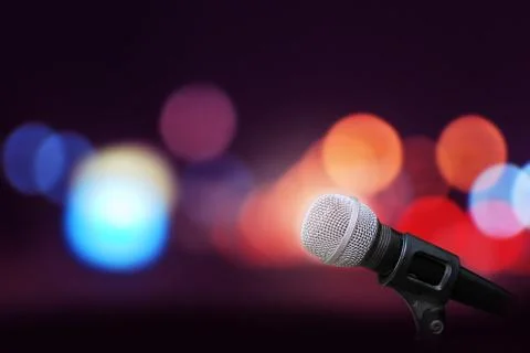 Microphone on stage background Stock Photos