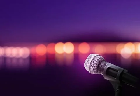 Microphone on stage background Stock Photos