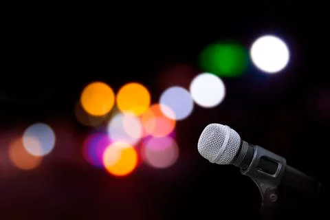 Microphone on stage background Stock Photos