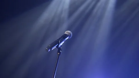 Microphone on stage on a black background. Stock Footage 225534481