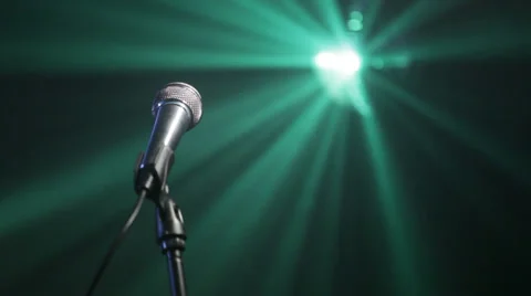 Microphone on stage with disco lights Stock Footage 35574950