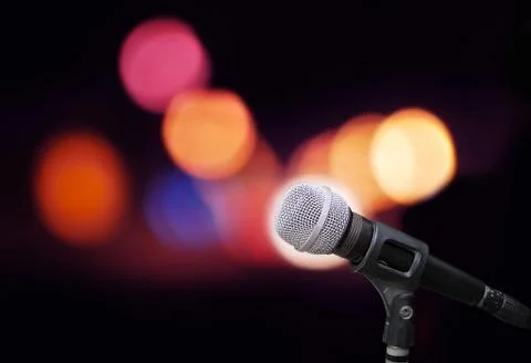 Microphone on stage isolate on out door background Stock Photos