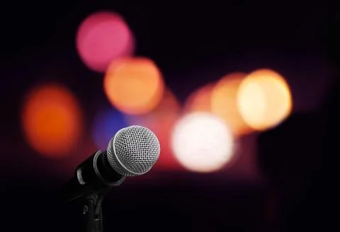 Microphone on stage isolate on out door background Stock Photos