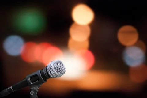 Microphone on stage isolate on out door background Stock Photos