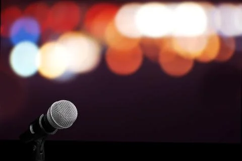 Microphone on stage isolate on out door background Stock Photos
