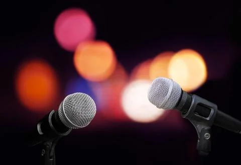 Microphone on stage isolate on out door background Stock Photos