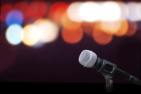 Microphone on stage isolate on out door background Stock Photos