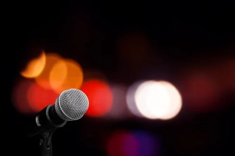 Microphone on stage isolate on out door background Stock Photos