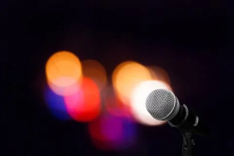 Microphone on stage isolate on out door background Stock Photos