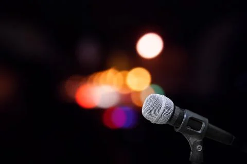 Microphone on stage isolate on out door background Stock Photos