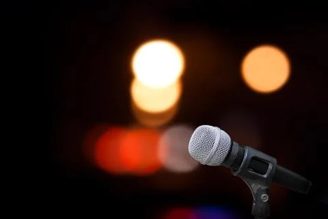 Microphone on stage isolate on out door background Stock Photos