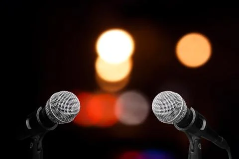 Microphone on stage isolate on out door background Stock Photos