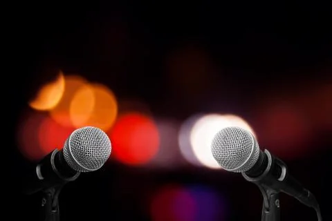 Microphone on stage isolate on out door background Stock Photos