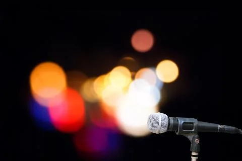 Microphone on stage isolate on out door background Stock Photos