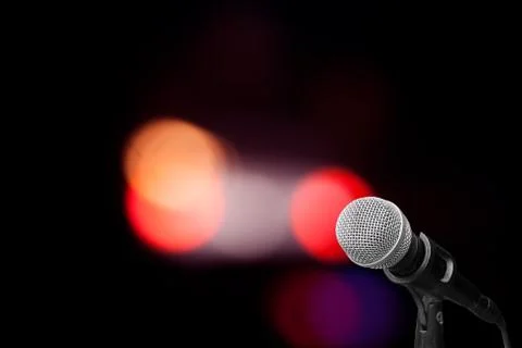 Microphone on stage isolate on out door background Stock Photos