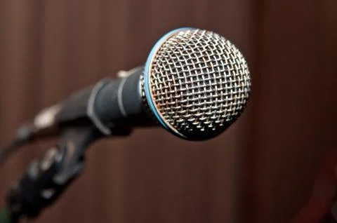 Microphone on stage Stock Photos