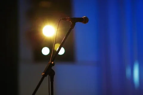 Microphone on stage Stock Photos