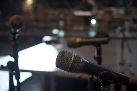 Microphone on stage Stock Photos