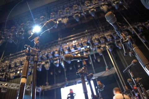 Microphone on stage Stock Photos