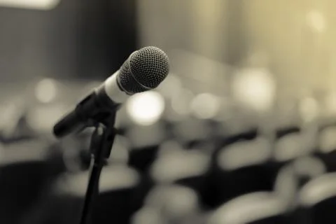 Microphone on the stage at the seminar. Stock Photos