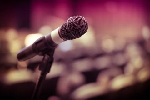 Microphone on the stage at the seminar. Stock Photos