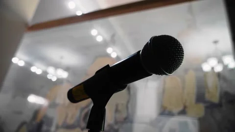 The microphone is on the stand behind the stage Video stock 178485911
