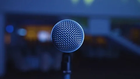 Microphone on the Stand is Standing on the Stage, Close-Up Microphone on the Stockbeeldmateriaal 73840872