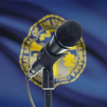 Microphone on stand with US state flag on background - Nebraska 스톡 사진