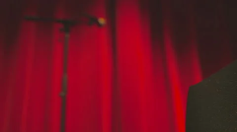 Microphone stands in front of curtain on stage Video stock 56863900