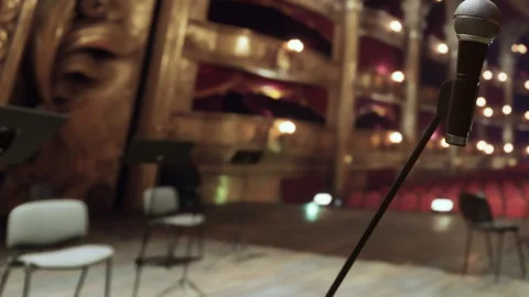Microphone stands on stage in a theater before a performance Stock Footage 344850755
