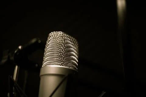 Microphone in the studio on a black background 库存照片