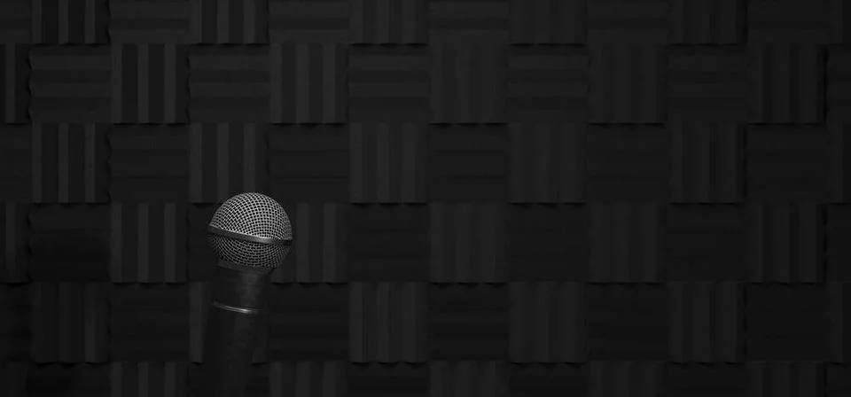 Microphone on a studio foam using as technical background or header, 3d re... Stock Photos