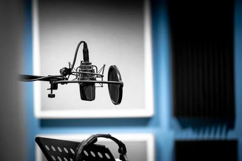 Microphone in the studio ready to record voice and music Stock Photos